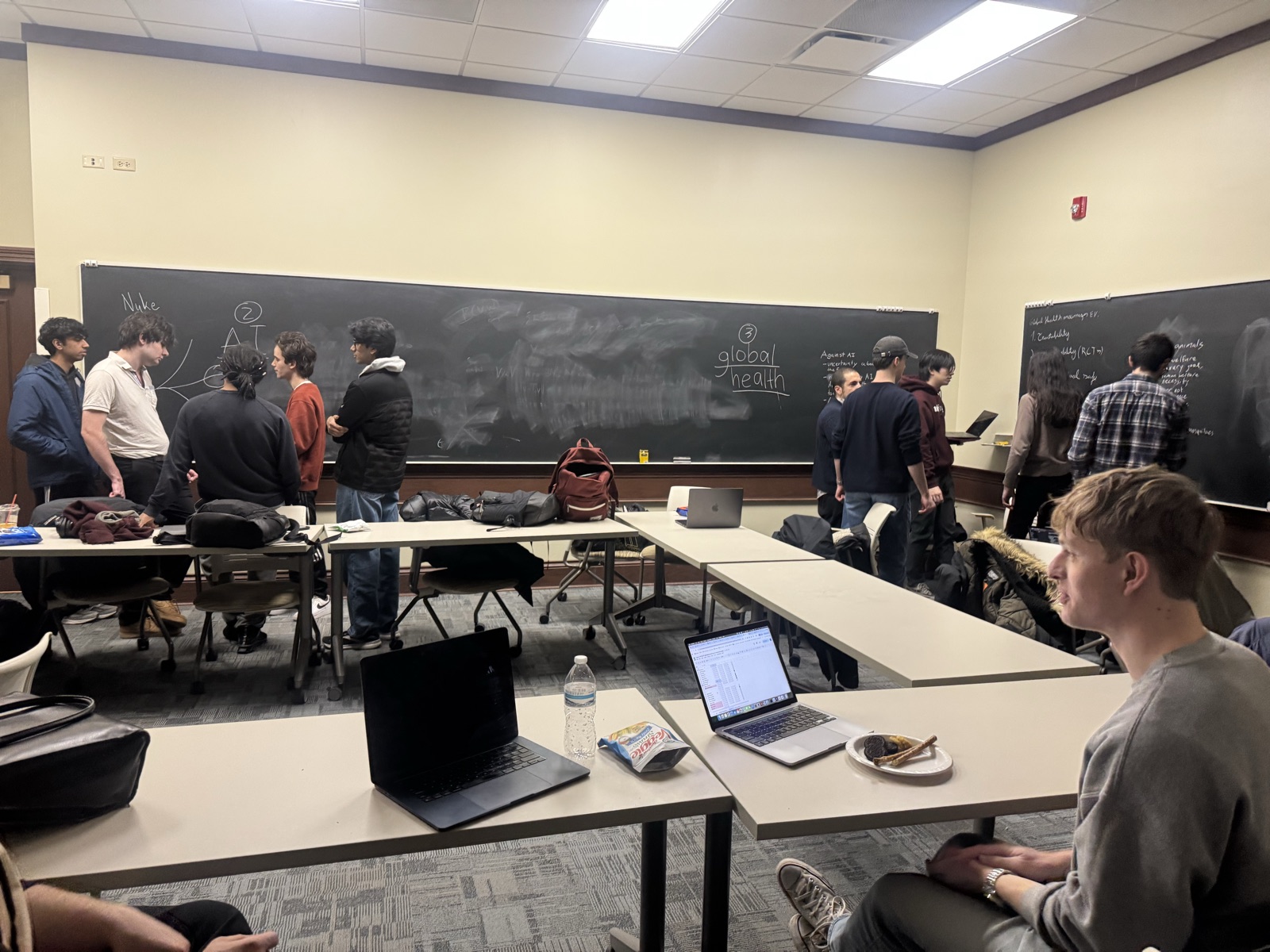 Cause prioritization discussion at a weekly meeting